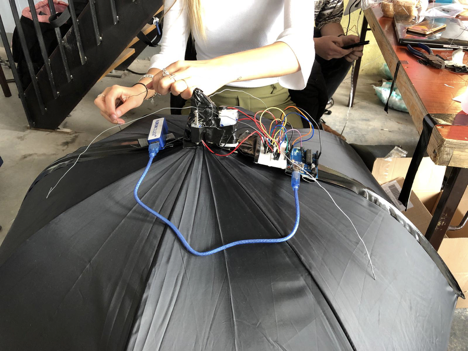 Electronics wired into umbrella